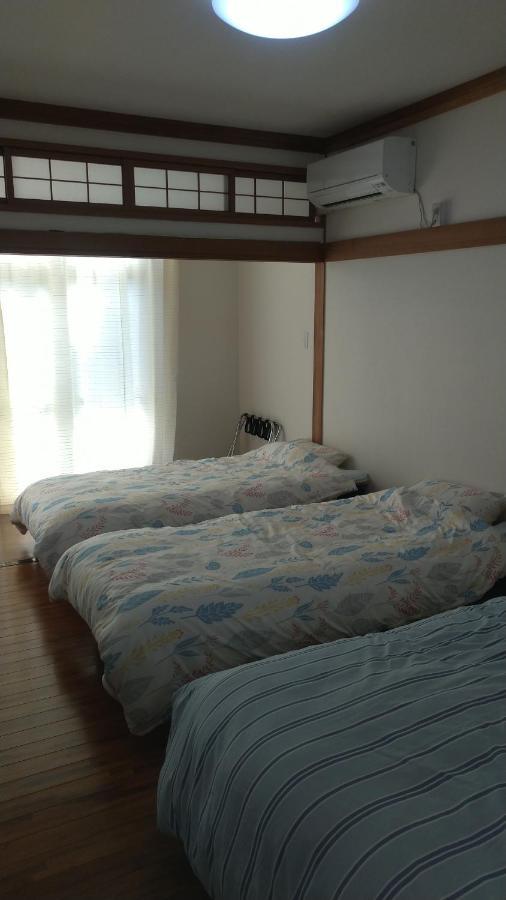 Hotel Kami House Amami Habitación foto